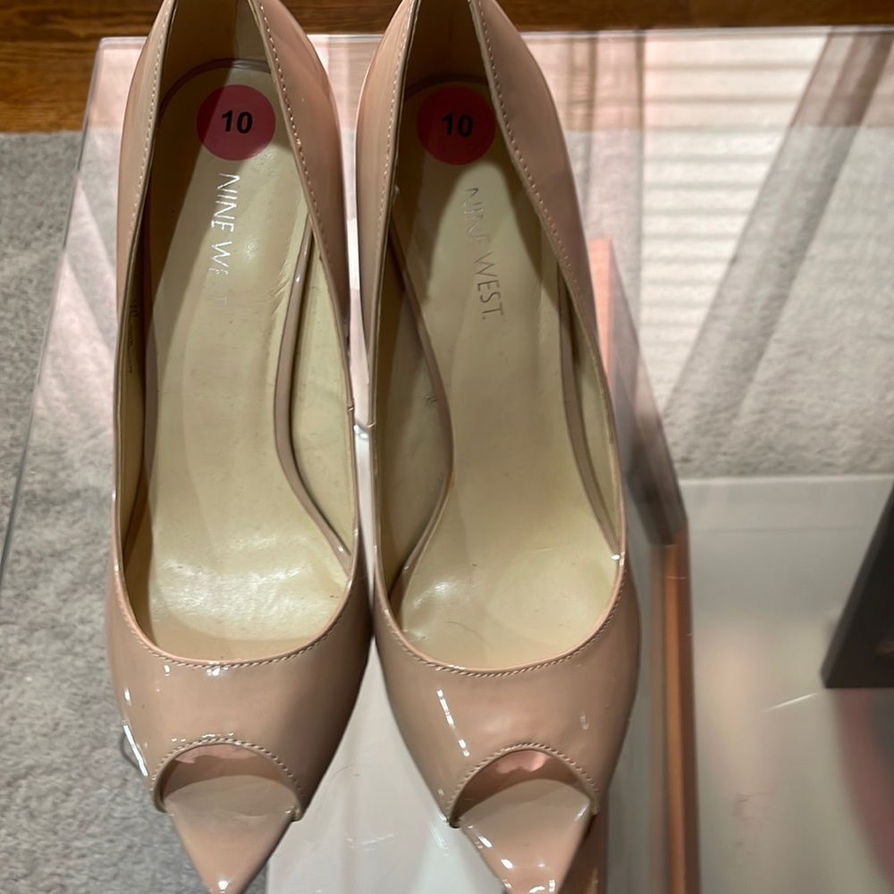 Only tried on - never worn heels.